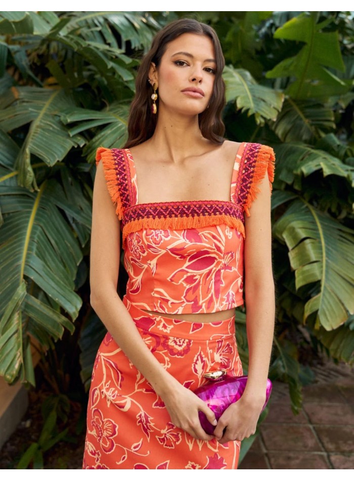 Orange printed top with bangs and wide straps