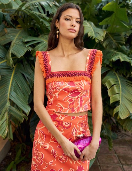 Orange printed top with bangs and wide straps