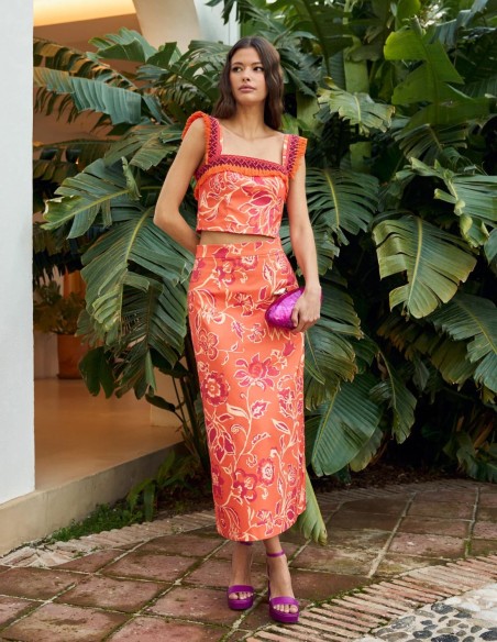 Orange printed top with bangs and wide straps