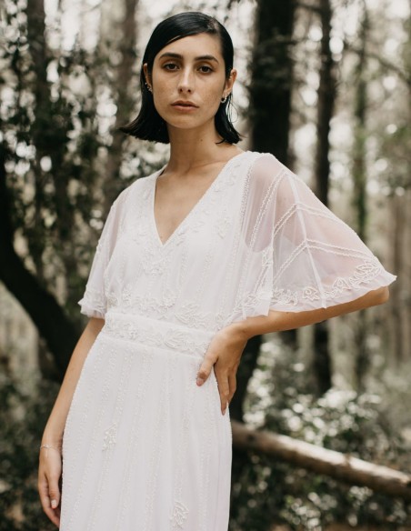 Vestido largo blanco con manga corta fluida