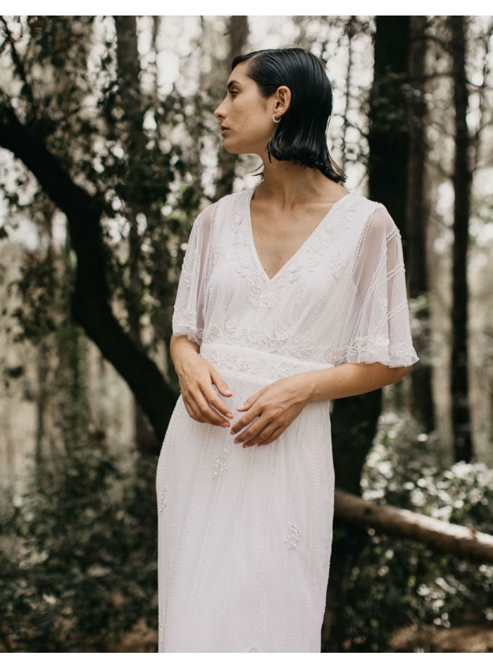 Vestido largo blanco con manga corta fluida