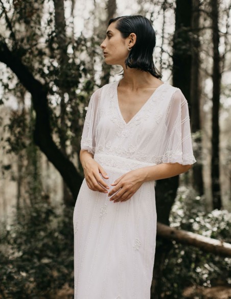 Vestido largo blanco con manga corta fluida
