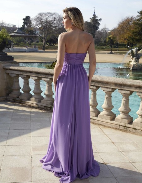 Long party dress with multi-position neckline and flowing fabric