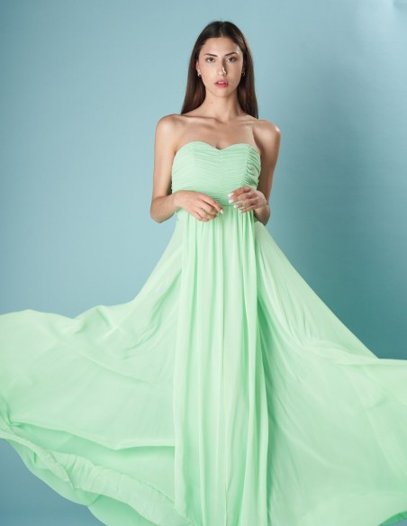 Long party dress with multi-position neckline and flowing fabric