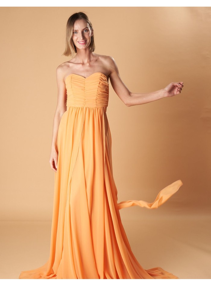 Long party dress with multi-position neckline and flowing fabric
