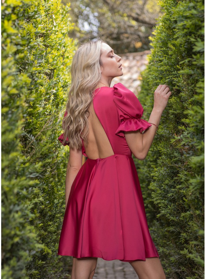 Short red dress with puffed sleeves and open back