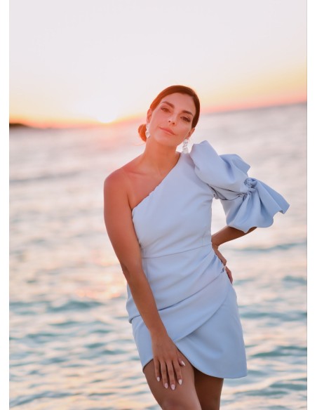 Short blue dress with asymmetrical neckline and puffed sleeves