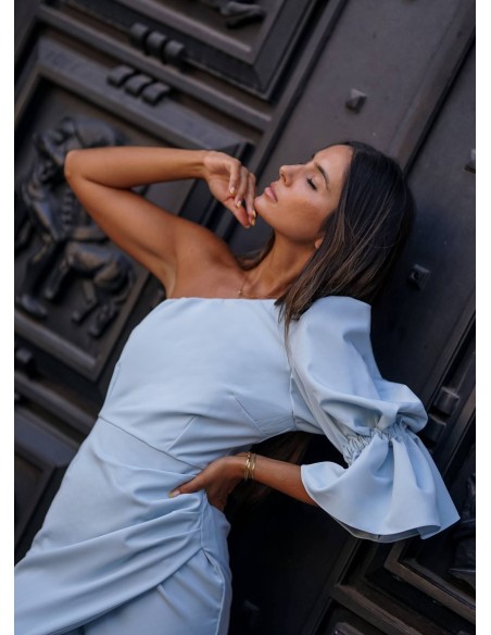 Short blue dress with asymmetrical neckline and puffed sleeves