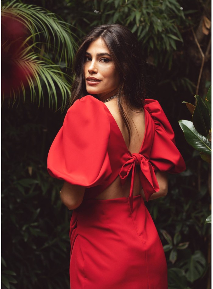 Short red dress with square neckline and draped...