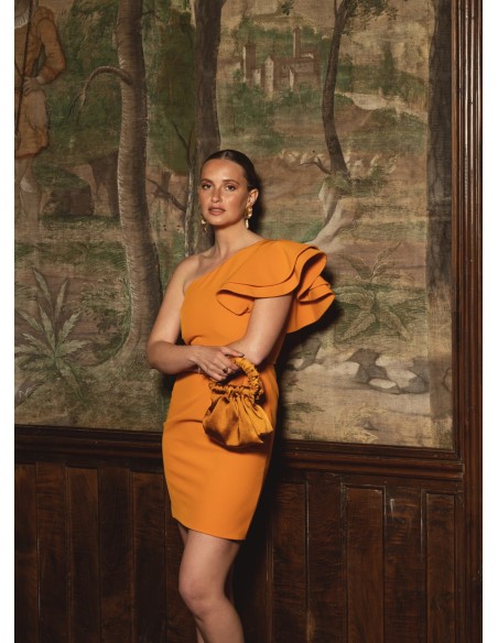 Short orange dress with ruffles on the sleeve
