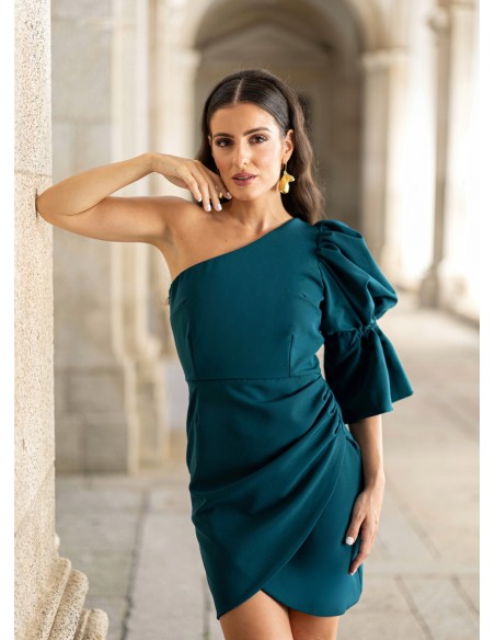 Short green dress with asymmetrical neckline