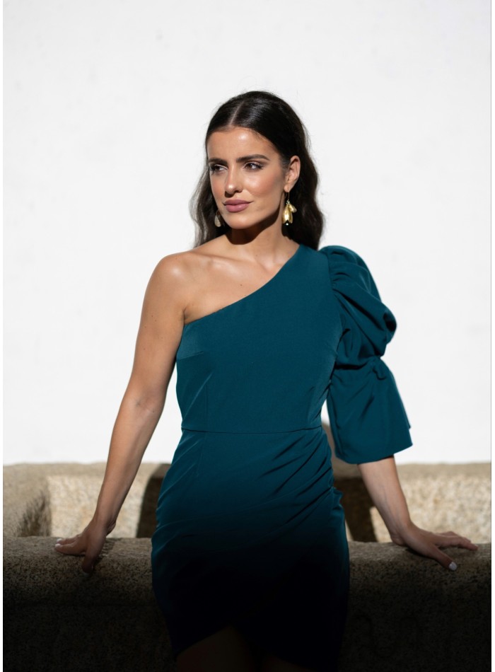 Short green dress with asymmetrical neckline