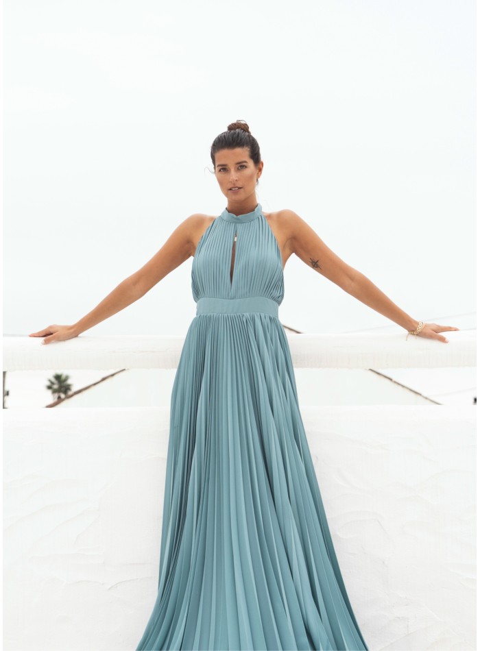 Pleated aqua green dress with halter neckline