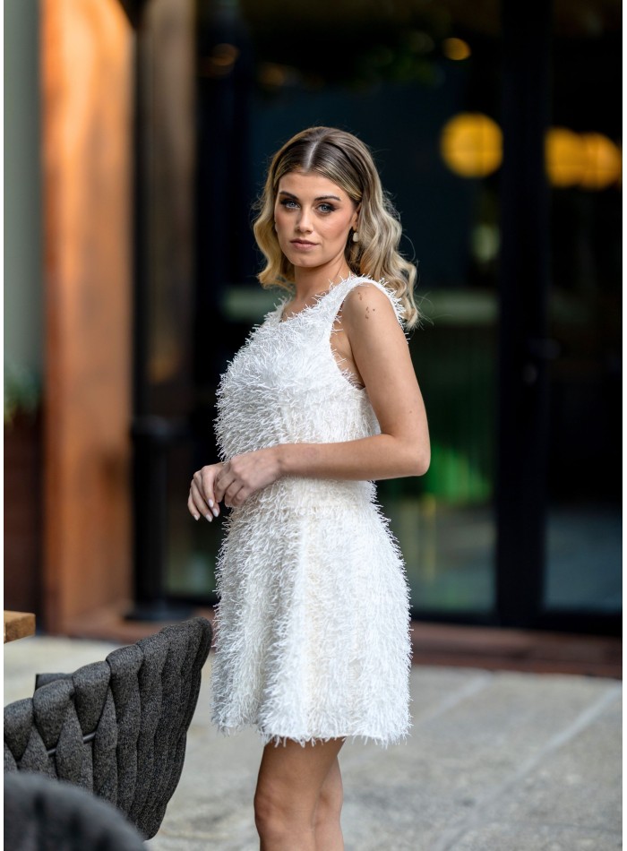 Vestido corto blanco con flecos