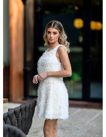 Vestido corto blanco con flecos