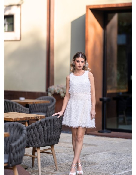 Vestido corto blanco con flecos