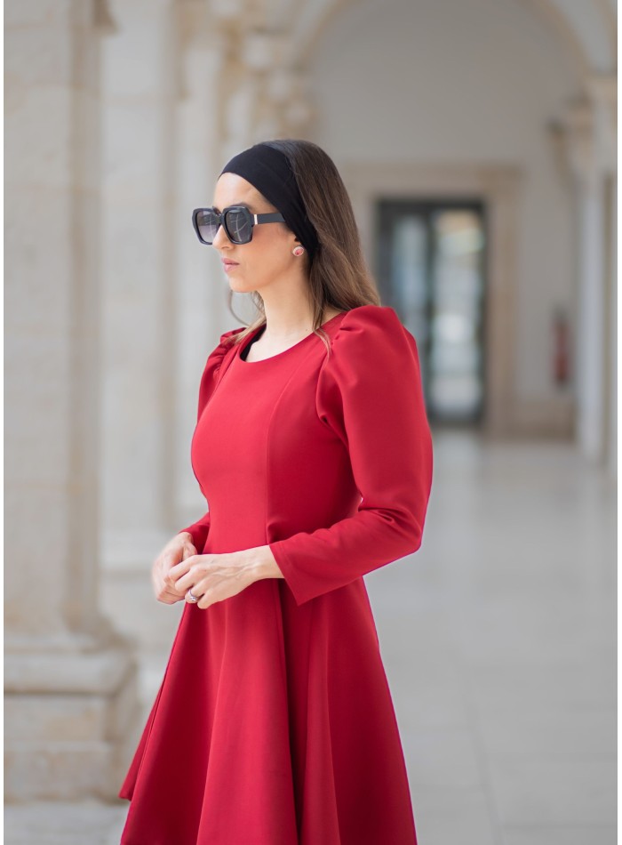 Short red dress with long sleeves and flounce