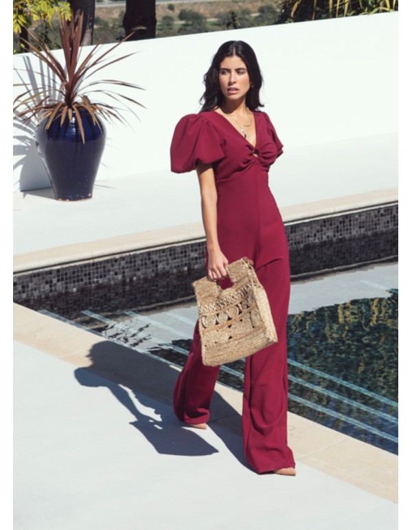 Burgundy jumpsuit with puffed sleeves and knotted back