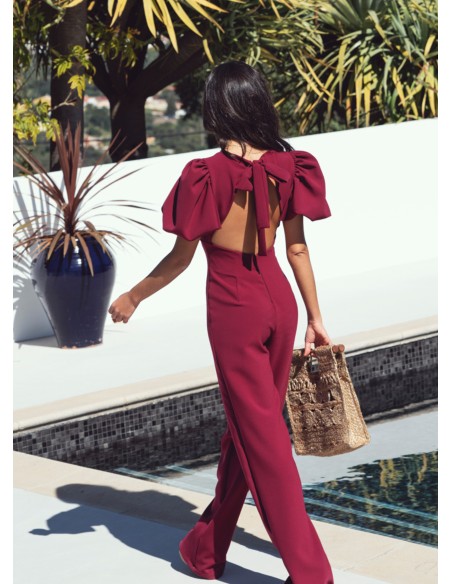 Burgundy jumpsuit with puffed sleeves and knotted back