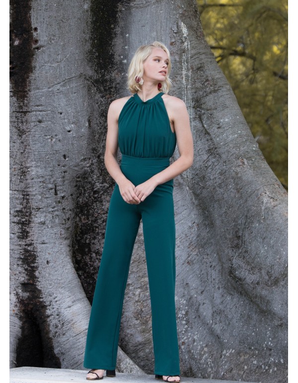 Green party jumpsuit with draped halter neckline