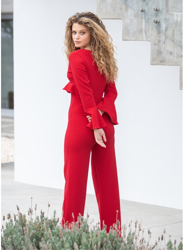 Long red jumpsuit with ruffles and long sleeves