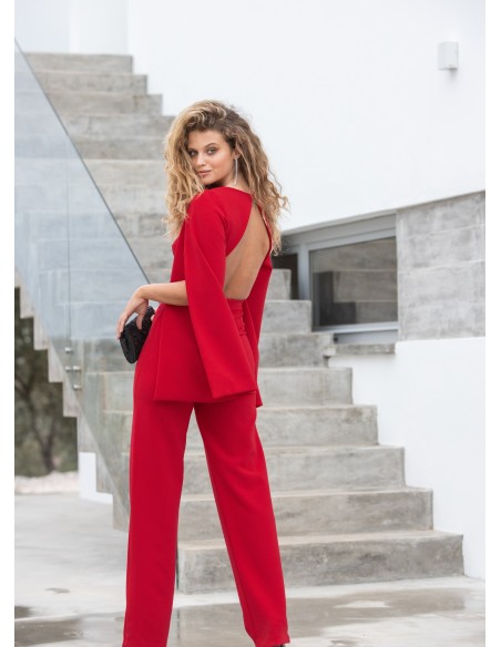 Red party jumpsuit with long cape sleeves