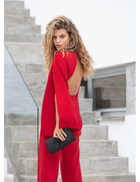 Red party jumpsuit with long cape sleeves