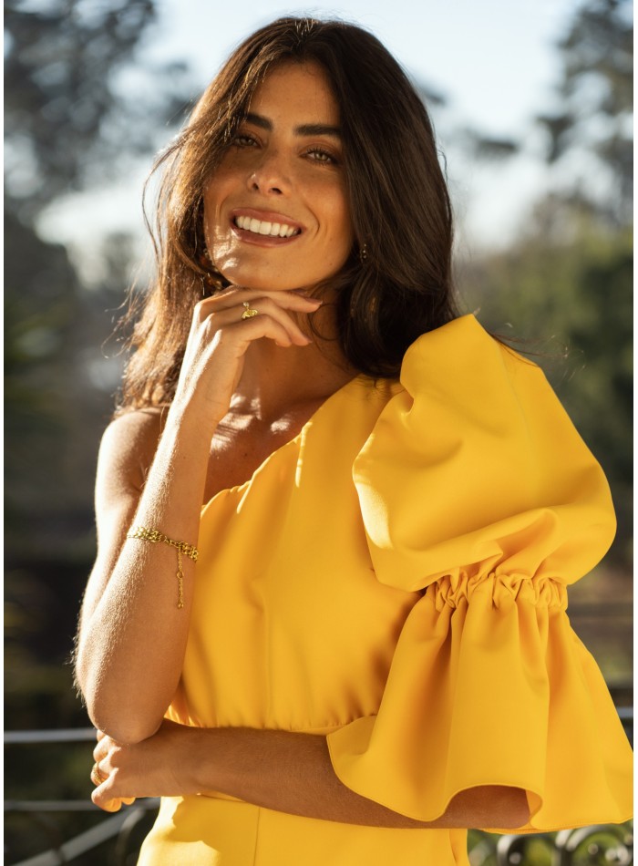 Yellow long jumpsuit with asymmetrical neckline...