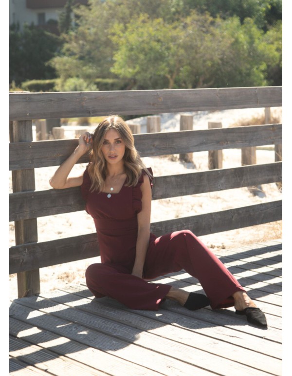 Long burgundy jumpsuit with side slits