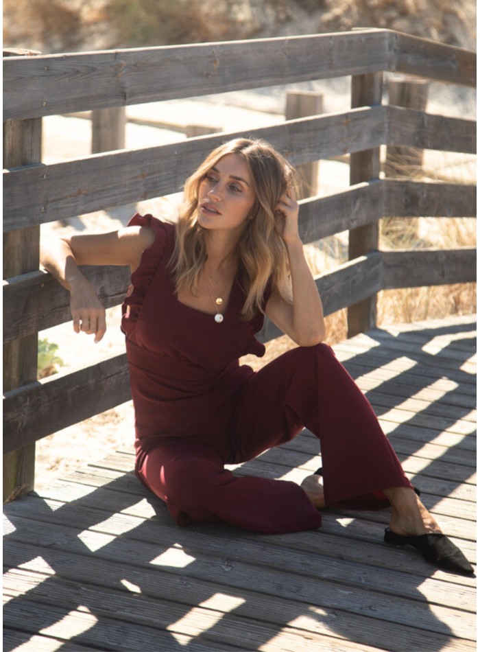 Long burgundy jumpsuit with side slits
