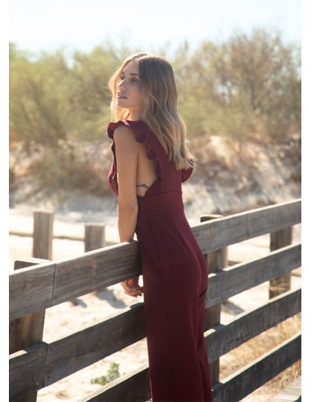 Long burgundy jumpsuit with side slits