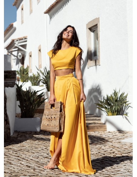 Yellow long skirt with invisible zipper and side slit