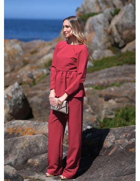 Red party blouse with long sleeves and peplum frill