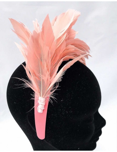 Pink satin headband with natural feathers for party