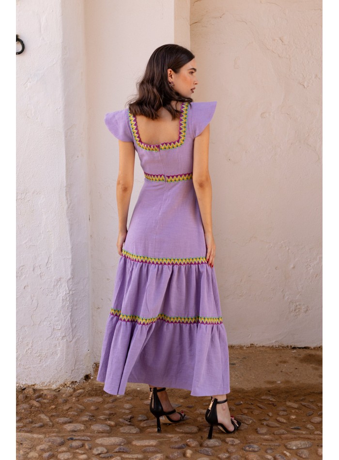 Vestido para invitada con falda de volantes y...