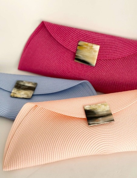 Raffia bag with square African horn closure