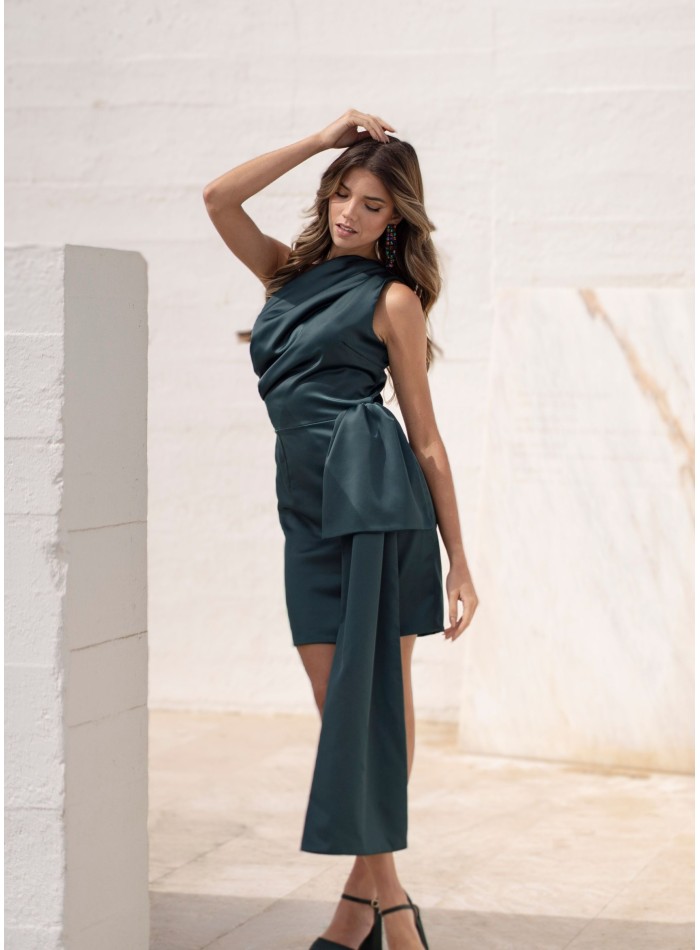 Short green dress with asymmetrical neckline