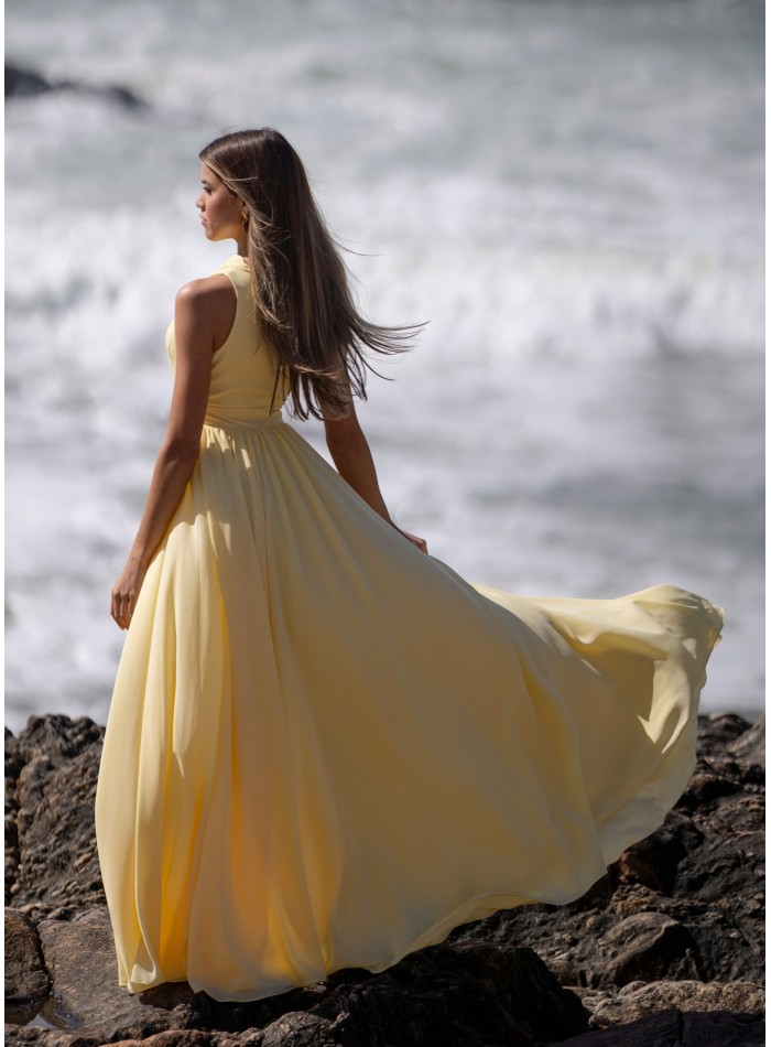 Light yellow long dress with asymmetrical...