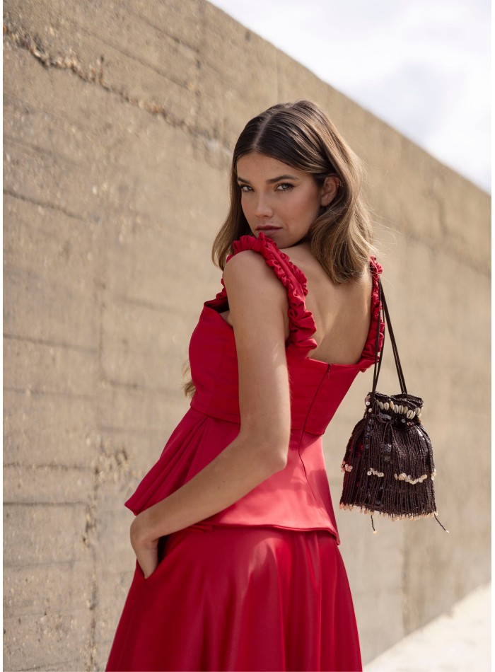 Red top with ruffles and sweetheart neckline