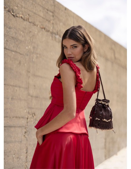 Red top with ruffles and sweetheart neckline