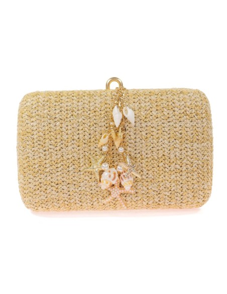 Sac de fête en raphia avec petits coquillages et coquilles de conque
