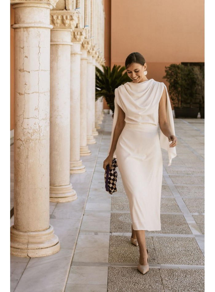 Draped party blouse with cape sleeves