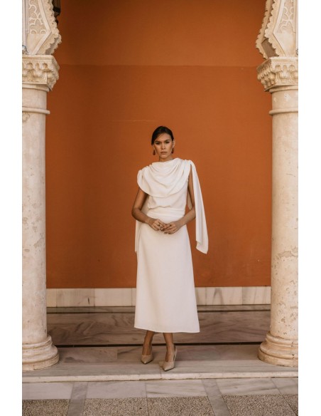 Blouse de fête drapée avec manches cape