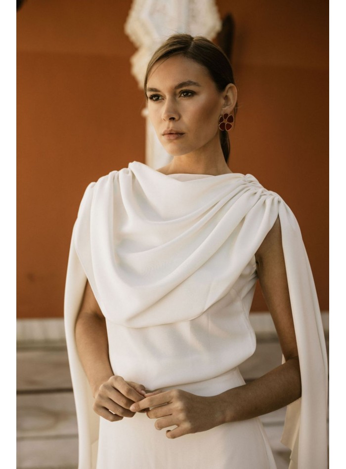 Draped party blouse with cape sleeves