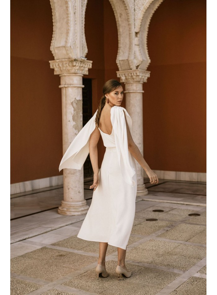 Draped party blouse with cape sleeves