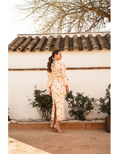 Asymmetrical printed top with lacing at the waist