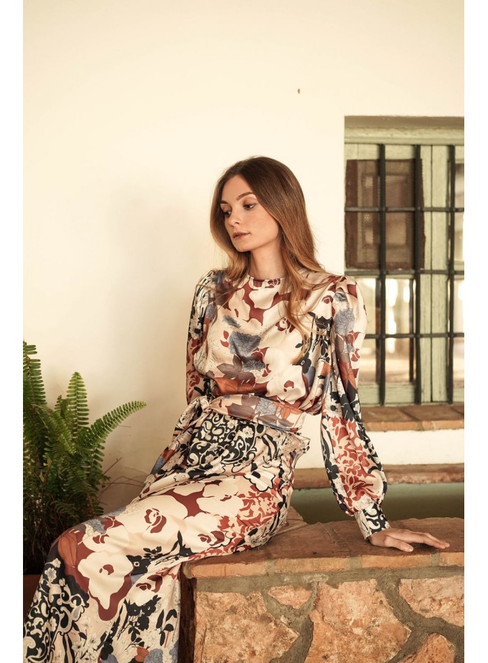 Top estampado tipo blusa con bajo asimétrico y lazada para ocasiones especiales