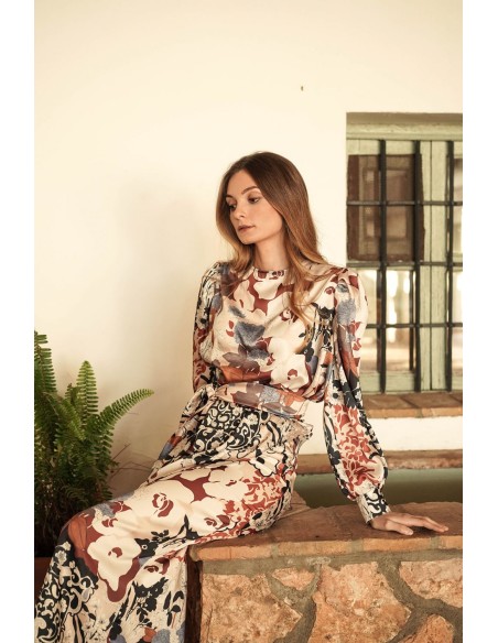 Printed blouse-type top with asymmetrical hem and lacing