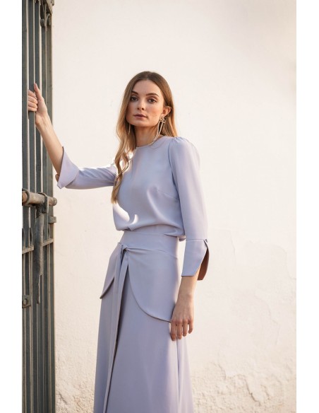 Top en color lavanda con detalle de puños Top en color lavanda con detalle de puños