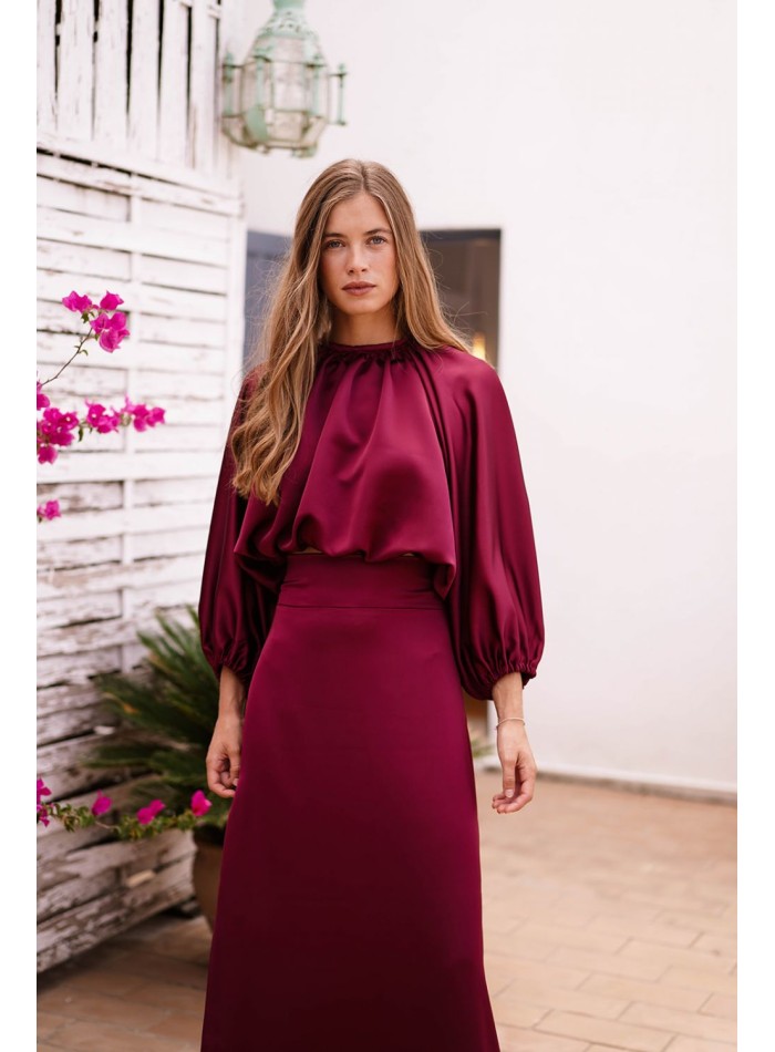 Long sleeve burgundy top with gathered at the waist